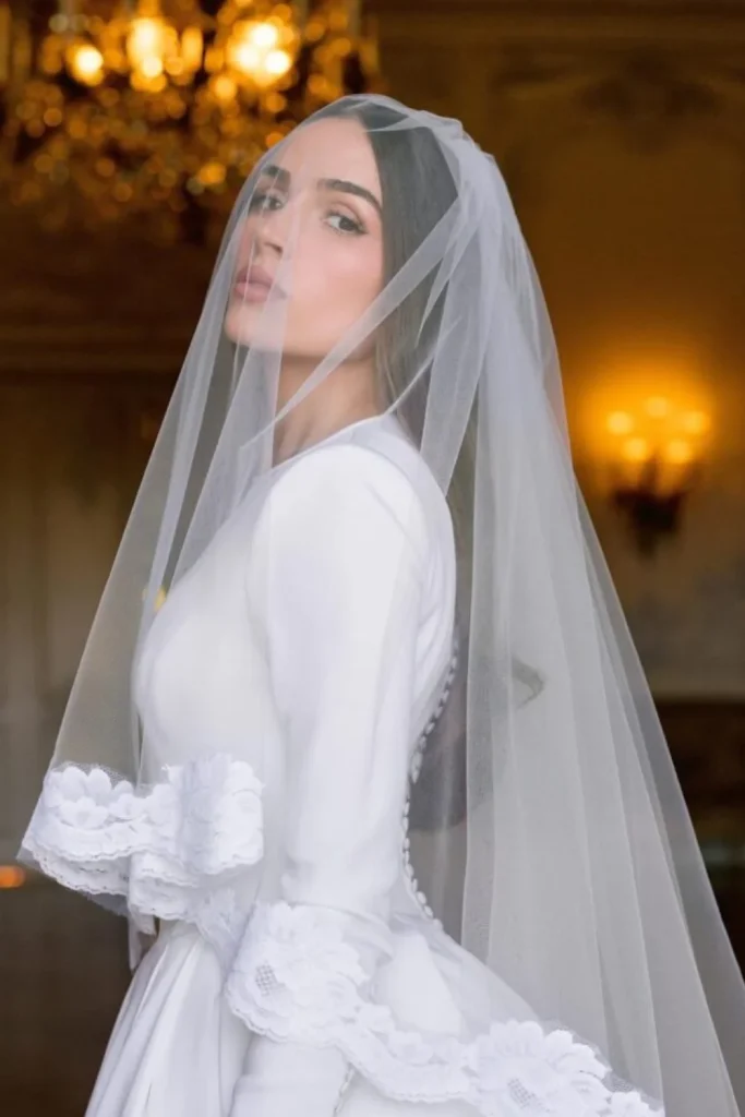 Olivia Culpo wedding dress controversy, Olivia Culpo wedding gown, Christian McCaffrey Olivia Culpo wedding, Olivia Culpo wedding backlash, Olivia Culpo dress criticism, Olivia Culpo Vogue interview, Olivia Culpo wedding 2024, Kennedy Bingham Olivia Culpo, Olivia Culpo wedding drama