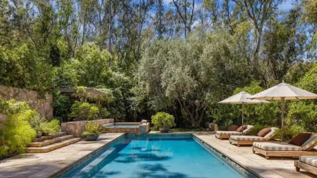 Olivia Culpo LA home, Christian McCaffrey home purchase, George Clooney estate sale, Studio City luxury real estate, celebrity home sales 2024, George Clooney former home, Olivia Culpo real estate, luxury homes Los Angeles, celebrity real estate transactions